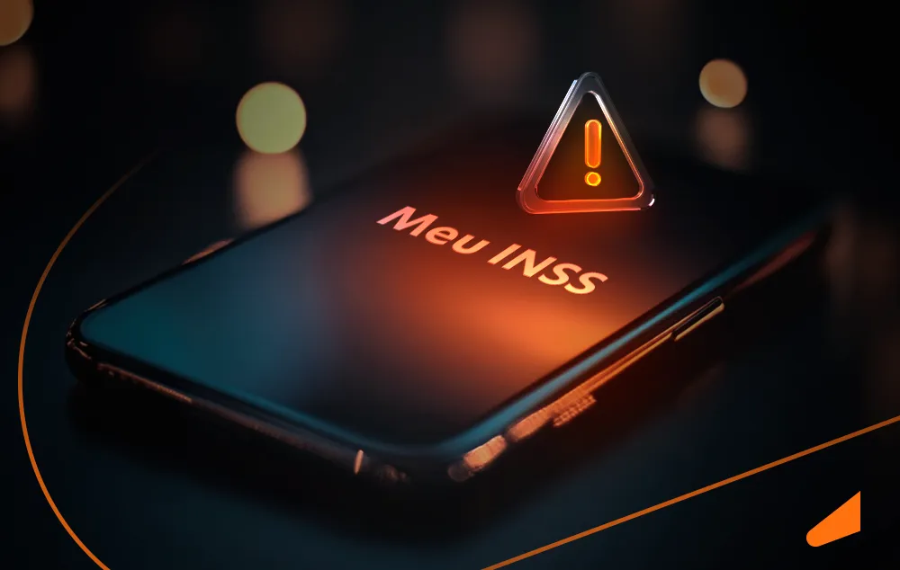 Celular com símbolo de alerta com a mensagem Meu INSS